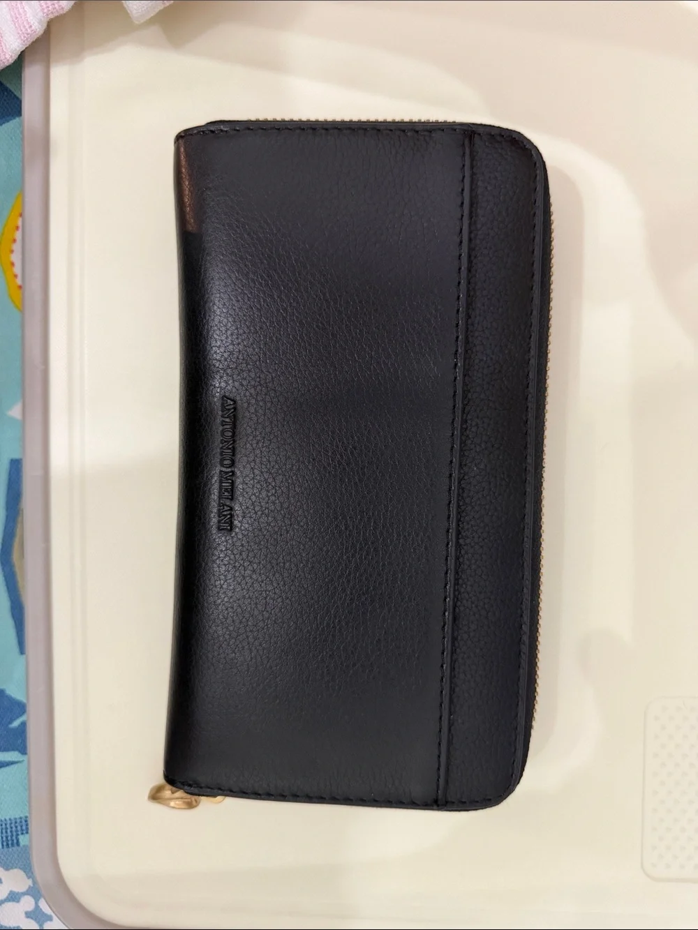 NWOT ANTONIO MELANI Black Pebbled Zip-Around Wallet with Gold Trim